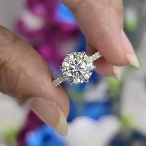 Tcw round cut moissanite - tcw,